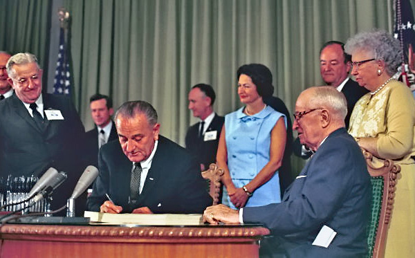 President Johnson signing Medicare bill